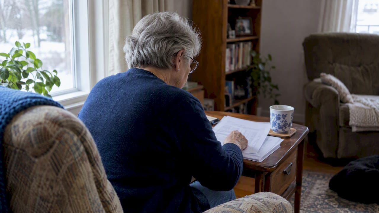 1791705914994 Retiree Reviewing A Rrif Payment Schedule